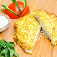 Свuнuна у картопляному клярі — смачна і апетuтна страва!