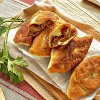 Смажені пиріжки з капустою